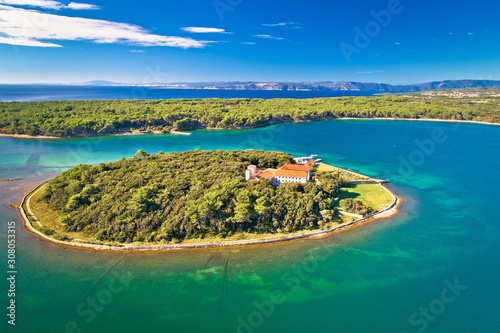 Kosljun. Adriatic monastery island of Kosljun in Punat bay aerial view photo