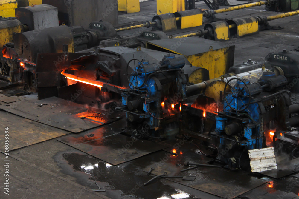 Steel rebar production. Hot iron machine in the factory.