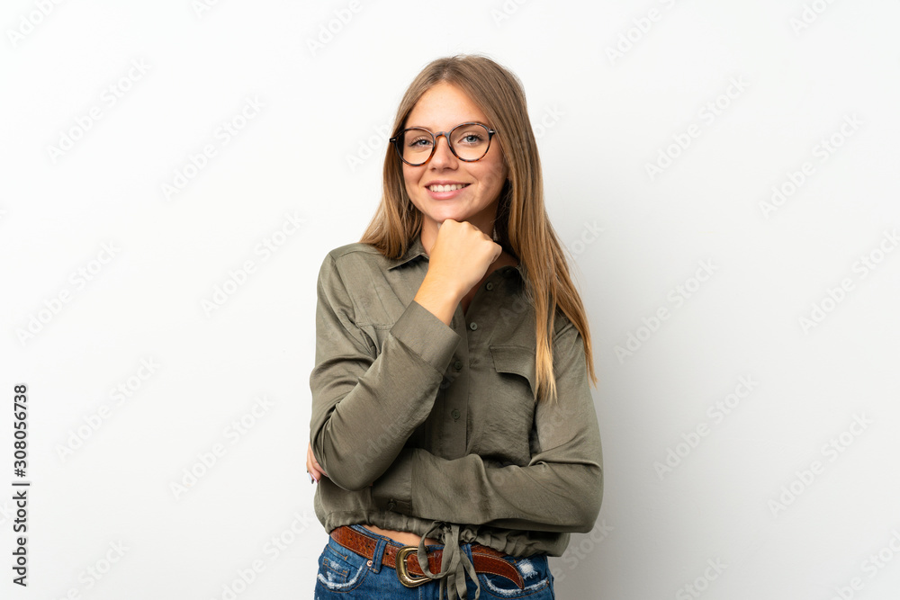 Lithuanian blonde girl over isolated white background with glasses and smiling Lithuanian blonde girl over isolated white background with glasses and smiling