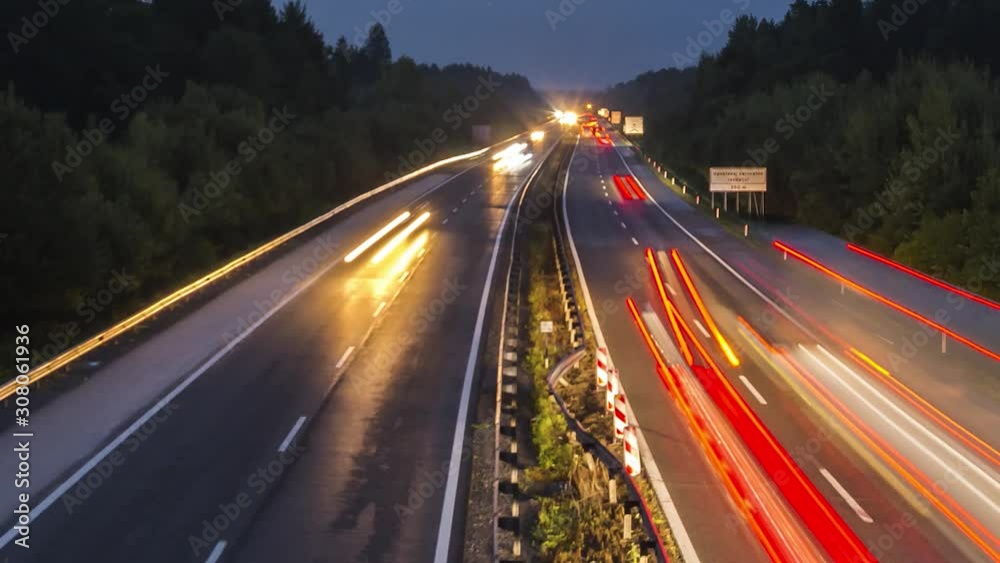 Time lapse aerial view over busy highway in the evening Time lapse aerial view over busy highway in the evening