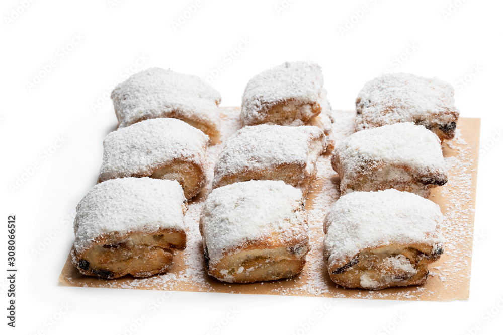 Freshly baked christmas stollen bites isolated on white Freshly baked christmas stollen bites isolated on white