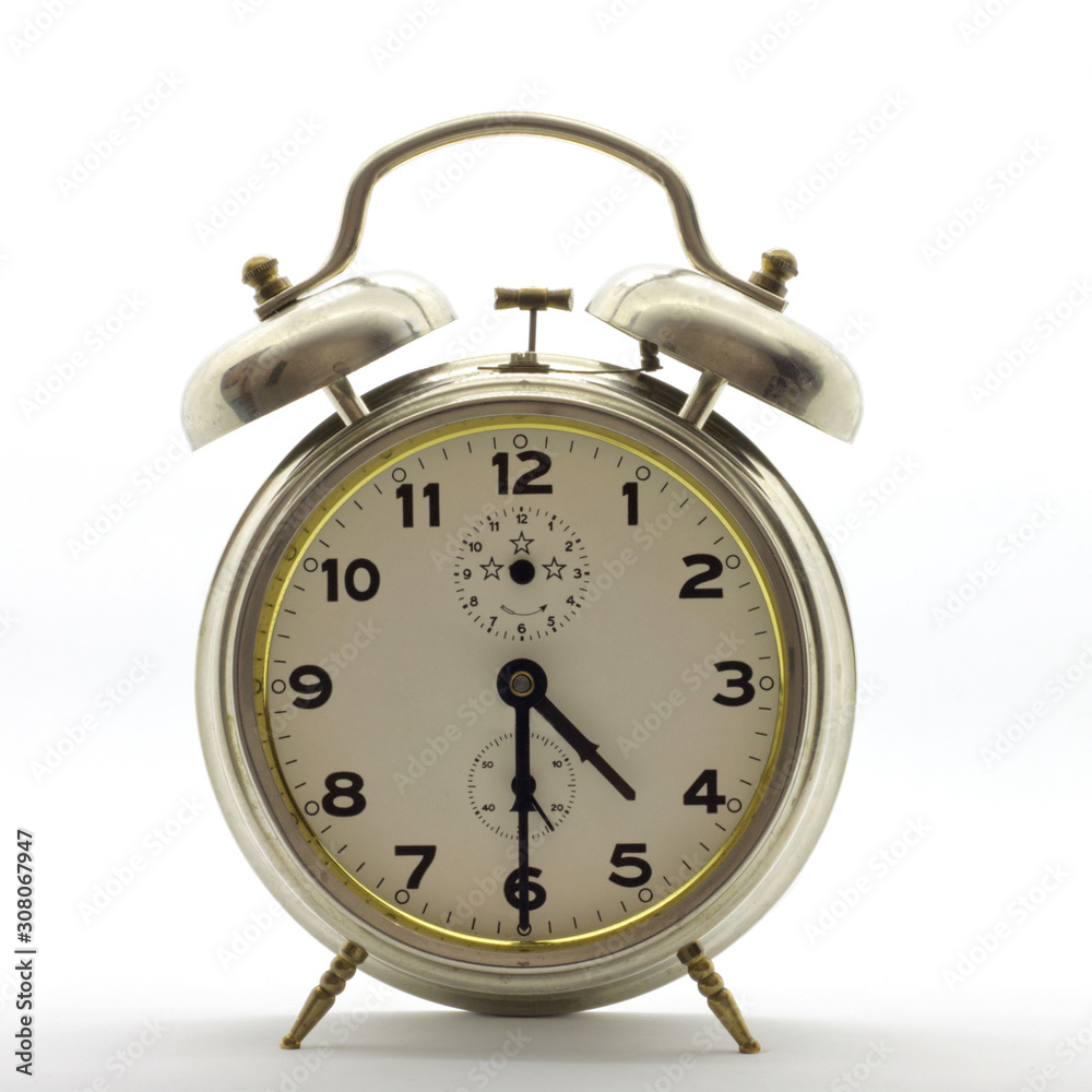 Old-style alarm clock, metal, it's half past four. Old-style alarm clock, metal, it's half past four.