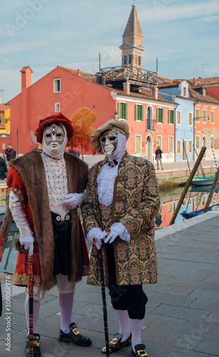  Masked and dressed up men posing on the street