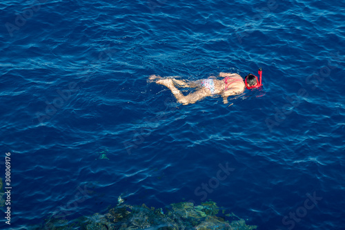 People at sea do snorkeling. Sea vacation concept