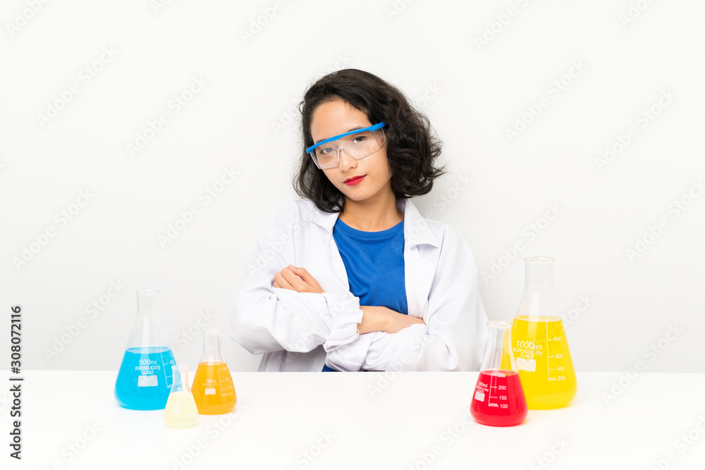 Young scientific asian girl keeping arms crossed Young scientific asian girl keeping arms crossed