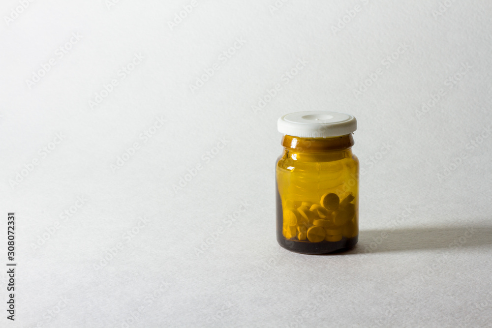 Jars of pills on a white background Jars of pills on a white background