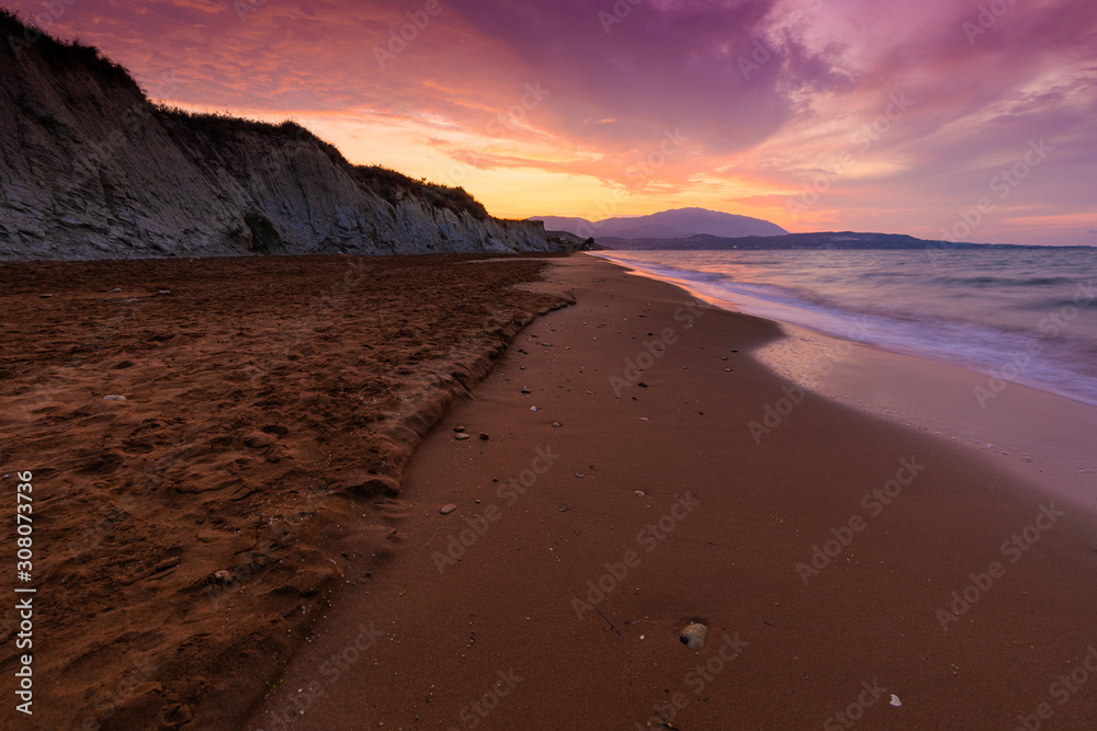 Xi Beach, Kefalonia Island, Greece. Beautiful view of Xi Beach, a beach with red sand in Cephalonia, Ionian Sea. Xi Beach, Kefalonia Island, Greece. Beautiful view of Xi Beach, a beach with red sand in Cephalonia, Ionian Sea.