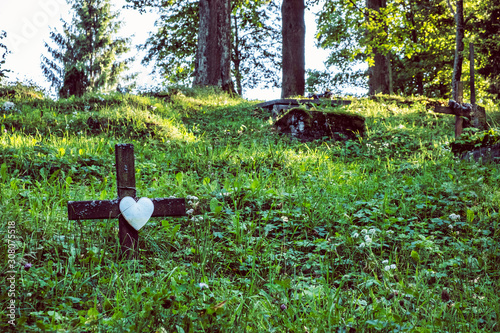 Old tomb stone, wooden articular church of Lestiny, Slovakia photo