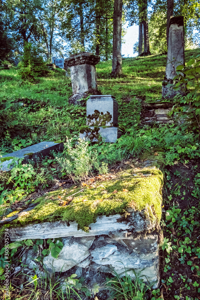 Old tomb stones, wooden articular church of Lestiny, Slovakia Old tomb stones, wooden articular church of Lestiny, Slovakia
