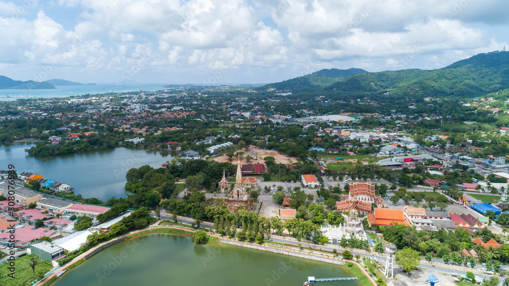 Aerial view drone shot of wat chalong temple or Wat Chaithararam in phuket thailand.