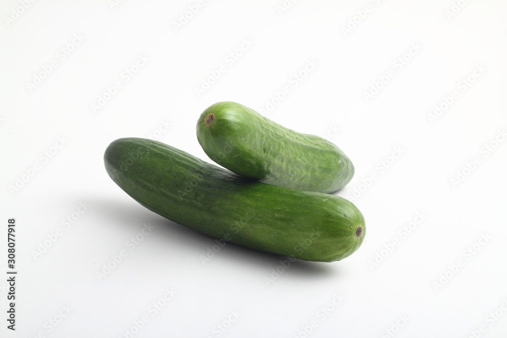Isolated cucumber. One whole cucumber isolated on white background, clipping path Isolated cucumber. One whole cucumber isolated on white background, clipping path
