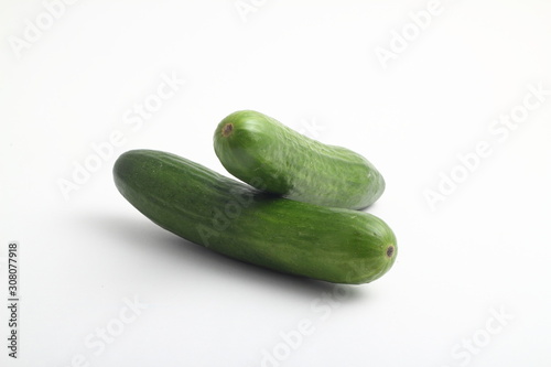 Isolated cucumber. One whole cucumber isolated on white background, clipping path