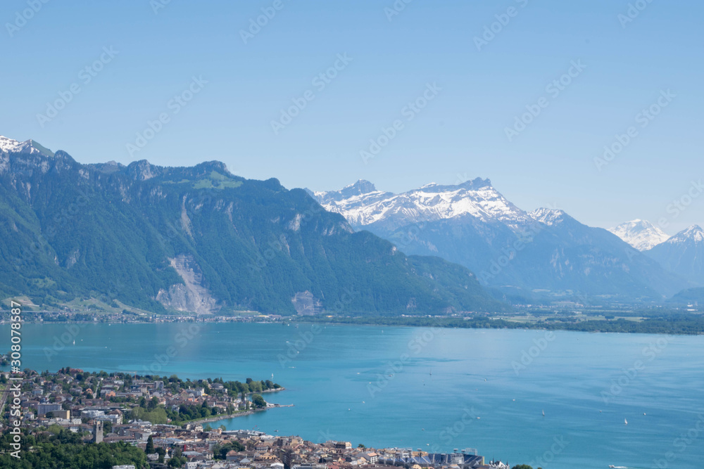 Alps Mountains and Vevey town near Geneva Lake