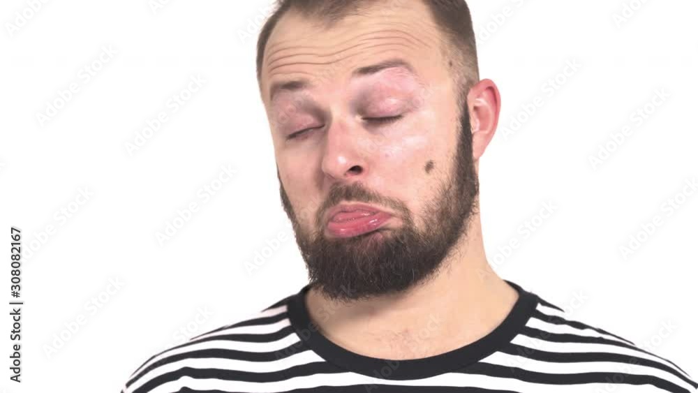 Close-up portrait of a young man. Body language and gestures concept. Hipster guy is disgusted. Close-up portrait of a young man. Body language and gestures concept. Hipster guy is disgusted.