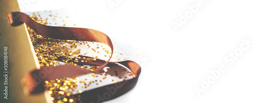 Golden box with golden stars with copy space