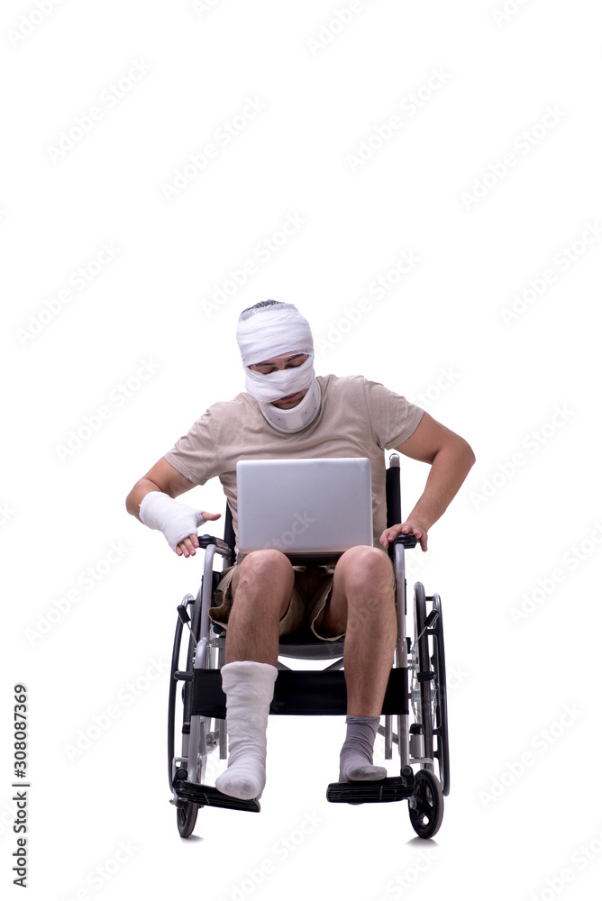 Injured man in wheel-chair isolated on white