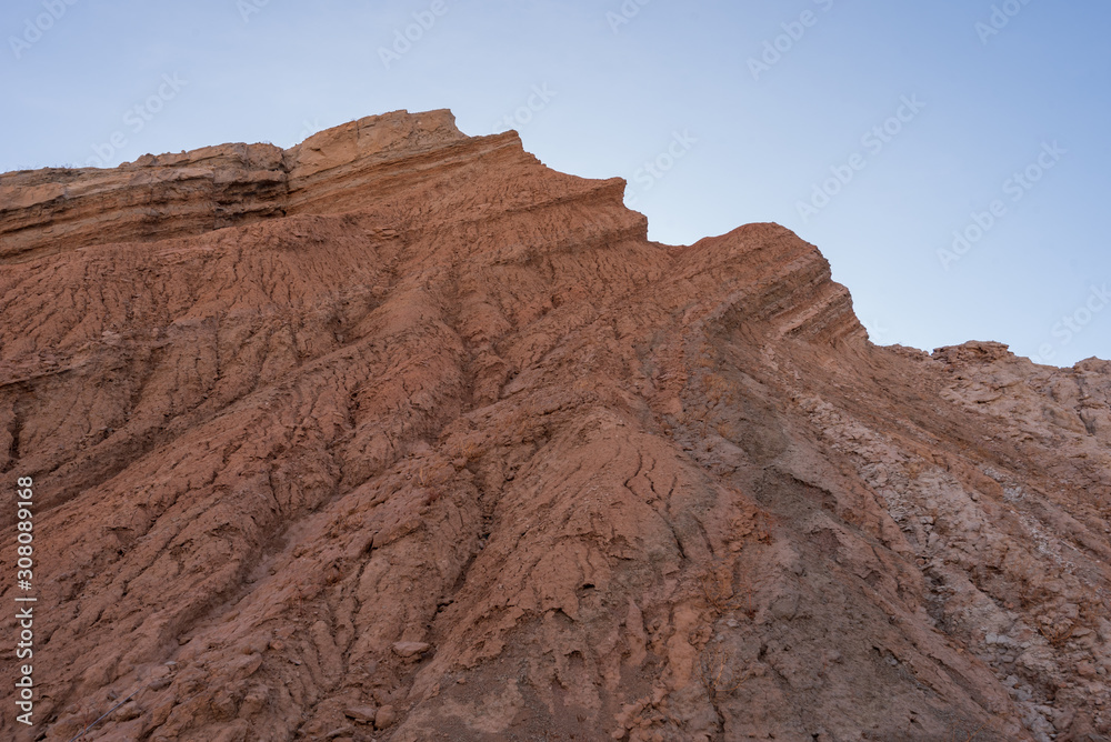 Landscape of barren jagged rock formation at Mecca Wilderness in southern California