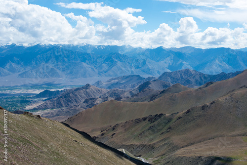 Ladakh, India - Aug 03 2019 - Riders on Between Khardung La Pass (5359m) and Leh in Ladakh, Jammu and Kashmir, India.