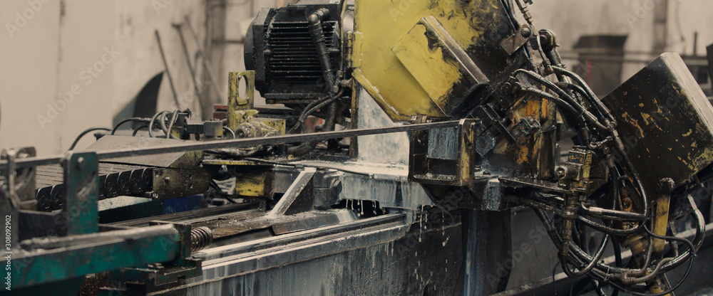 Steel cog gear set of metal sheet bending machine in metalwork factory. Steel cog gear set of metal sheet bending machine in metalwork factory.
