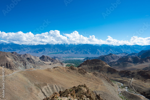 Ladakh, India - Aug 03 2019 - Riders on Between Khardung La Pass (5359m) and Leh in Ladakh, Jammu and Kashmir, India. photo