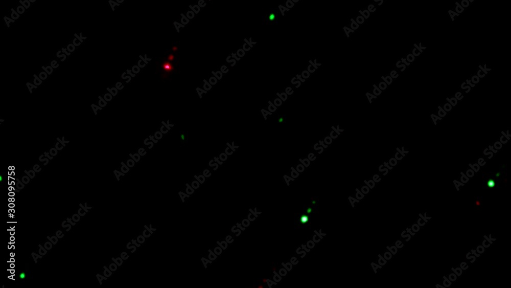 Beautiful colorful background / texture. Flashing  and moving green and red lights. Party, holidays background.