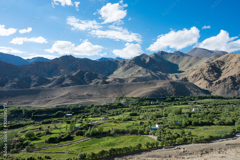Fototapeta premium Ladakh, India - Aug 03 2019 - Riders on Between Khardung La Pass (5359m) and Leh in Ladakh, Jammu and Kashmir, India.