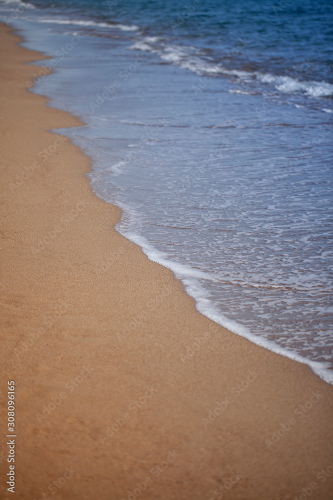 Sea waves hit the shore