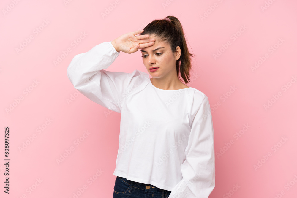 Young brunette girl over isolated pink background with tired and sick expression Young brunette girl over isolated pink background with tired and sick expression