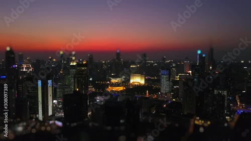 Wallpaper Mural sunset night time shanghai downtown cityscape rooftop aerial panorama 4k tilt shift china Torontodigital.ca