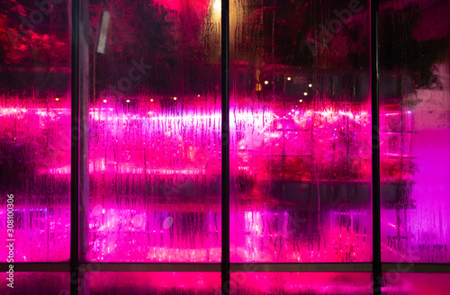 vaporwave windows with purple and condense in a greenhouse in Amsterdam