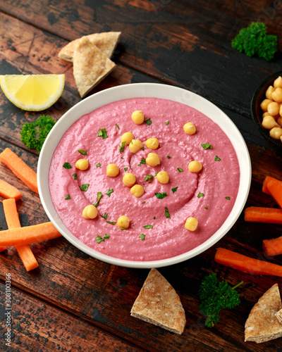 Beetroot Hummus with chickpea, olive oil, lemon, carrots and pita bread
