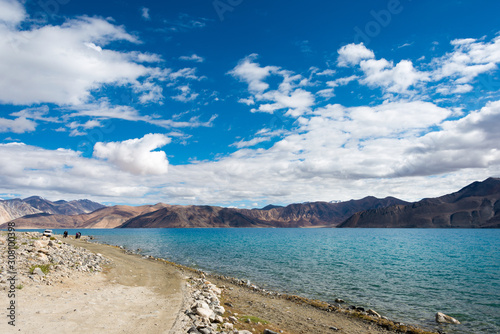 Fototapeta Naklejka Na Ścianę i Meble -  Ladakh, India - Aug 05 2019 - Pangong Lake view from Between Spangmik and Maan in Ladakh, Jammu and Kashmir, India. The Lake is an endorheic lake in the Himalayas situated at a height of about 4350m.