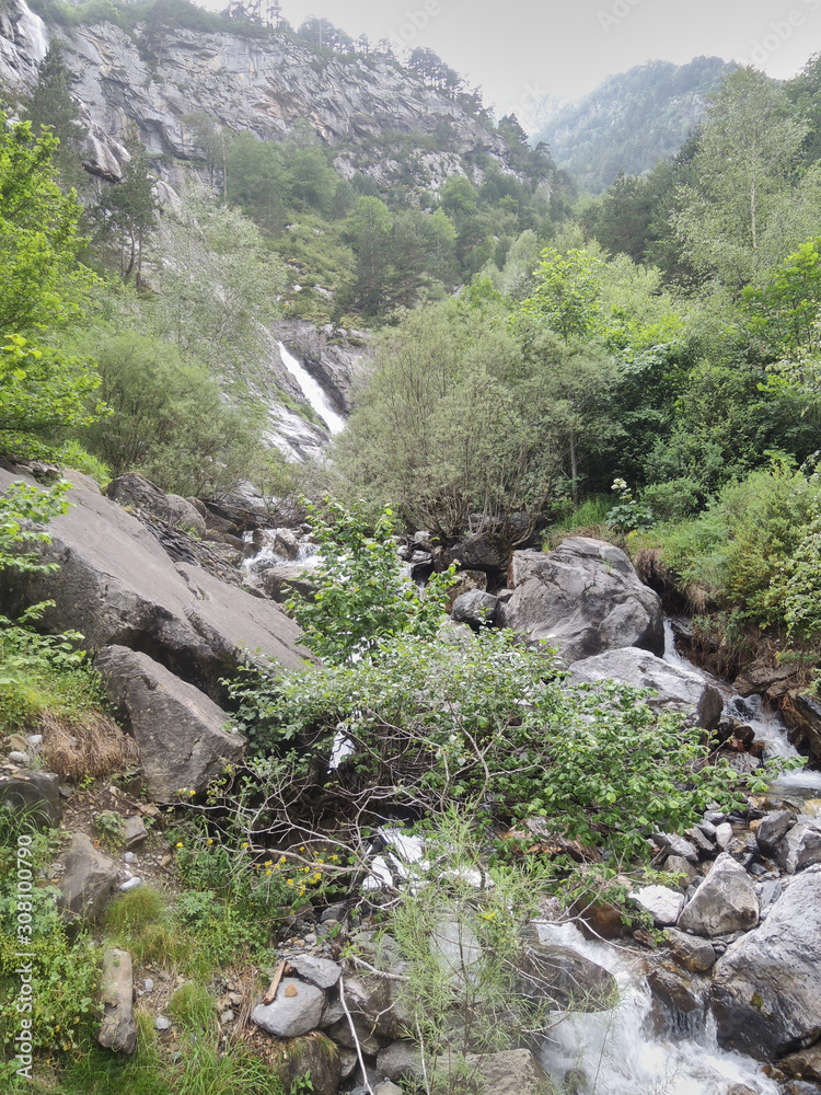 A waterfall in the Bujaruelo valley. National Park of Ordesa and Monte Perdido in the Pyrenees of the province of Huesca. Aragon. Spain A waterfall in the Bujaruelo valley. National Park of Ordesa and Monte Perdido in the Pyrenees of the province of Huesca. Aragon. Spain
