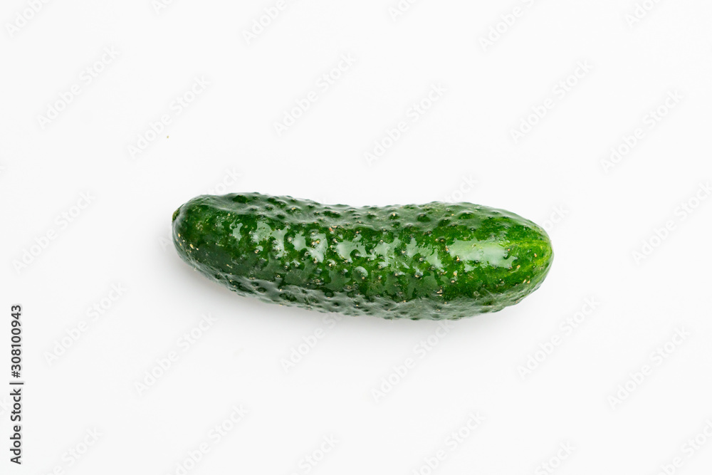 the green cucumber flat lay isolate on the flat surface, minimalist concept, pastel color the green cucumber flat lay isolate on the flat surface, minimalist concept, pastel color
