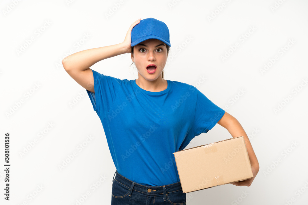 Young delivery girl over isolated white background with surprise facial expression Young delivery girl over isolated white background with surprise facial expression
