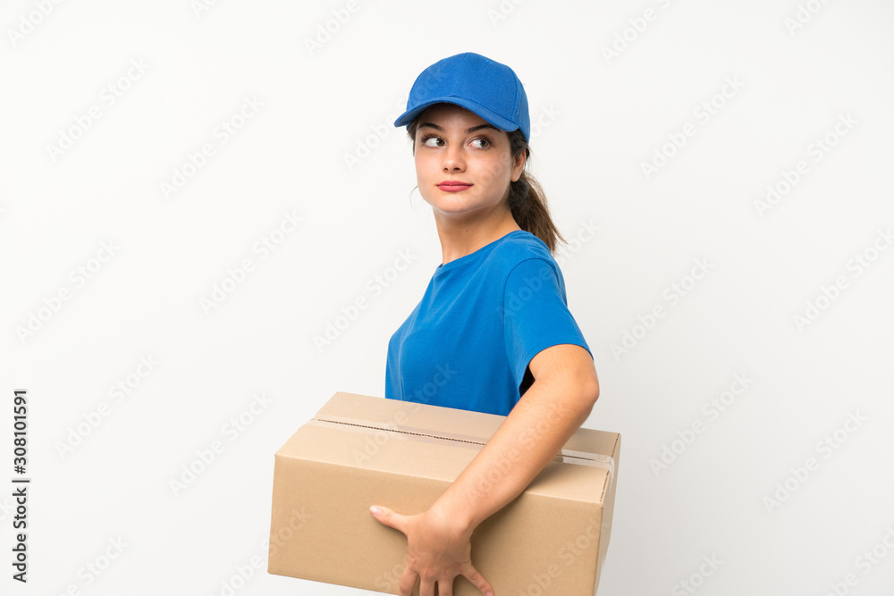 Young delivery girl over isolated white background laughing Young delivery girl over isolated white background laughing