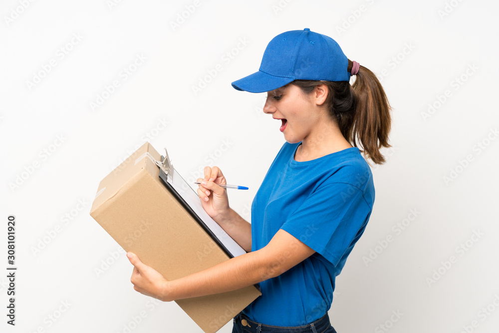 Young delivery girl over isolated white background Young delivery girl over isolated white background