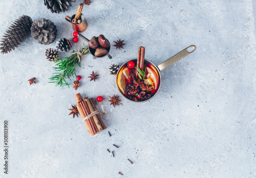 Mulled wine hot drink with citrus and spices, hot drink, winter concept, Christmas season