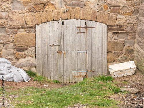 Old wooden locked door