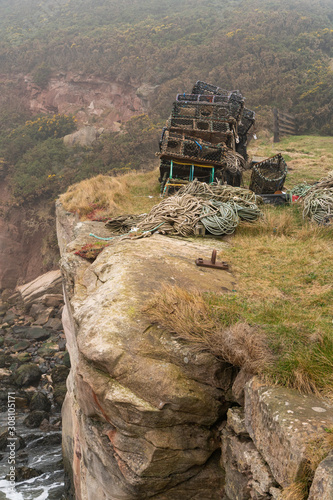 Lobster pots on a cliff edge