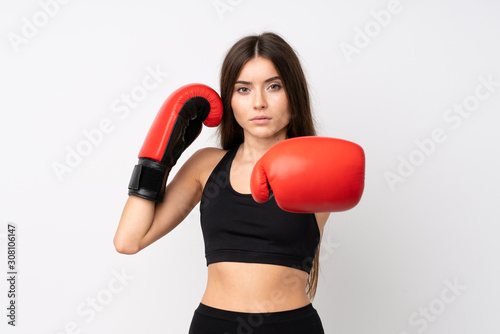 Young sport woman over isolated white background with boxing gloves