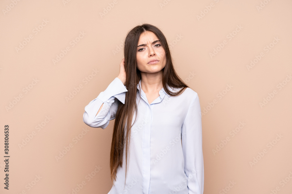 Young woman over isolated background having doubts Young woman over isolated background having doubts