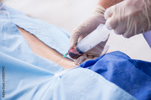 Female patient getting an injection in the clinic