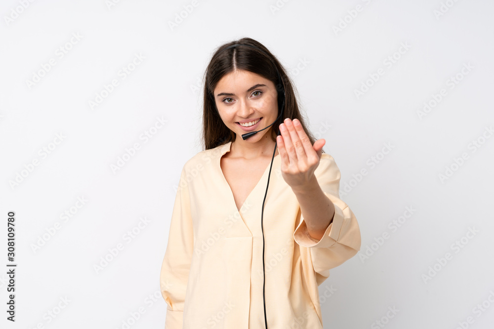 Young telemarketer woman over isolated white background inviting to come Young telemarketer woman over isolated white background inviting to come