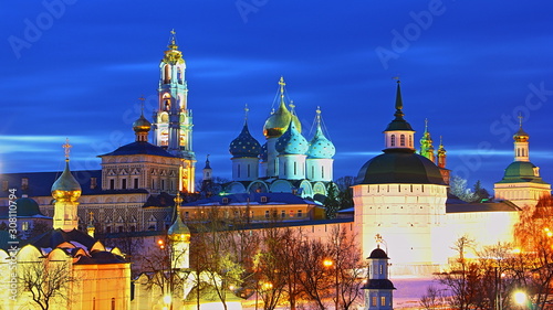 Famous Russian Golden Ring landmark, Troitse Sergieva Lavra in Sergiev Posad winter night, beautiful bright view on blue sky background from Observation deck photo