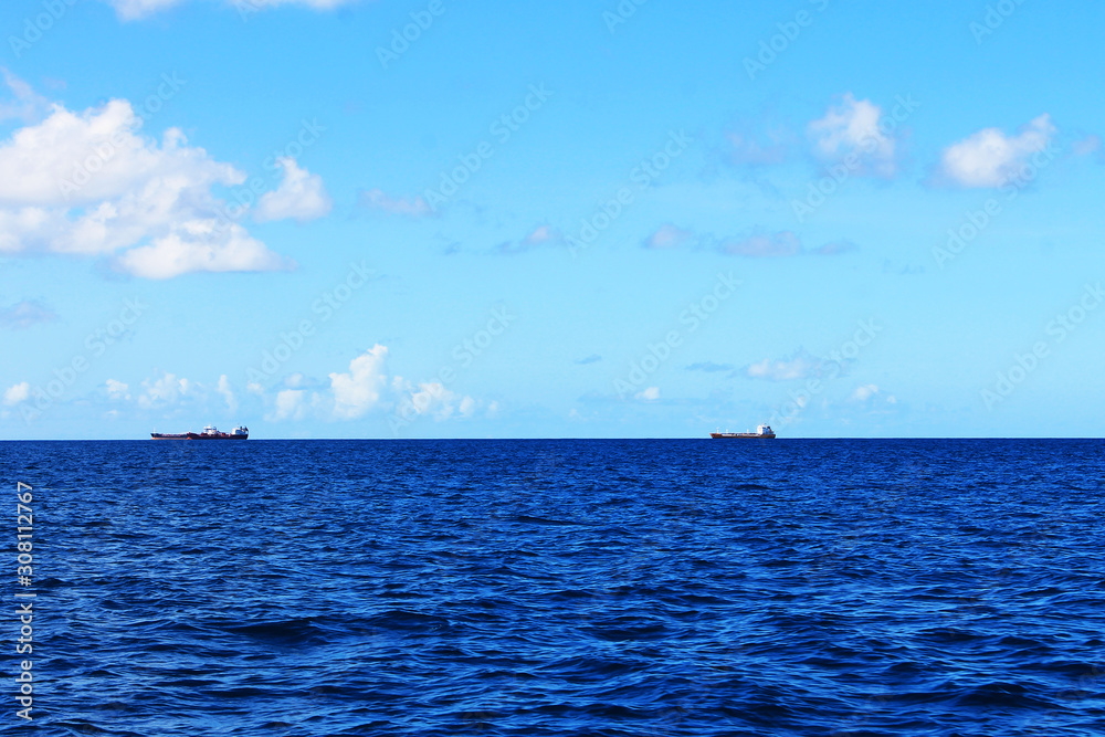 Oil Tankers on the horizon, Caribbean Sea off the coast of St. Lucia, West Indies Oil Tankers on the horizon, Caribbean Sea off the coast of St. Lucia, West Indies