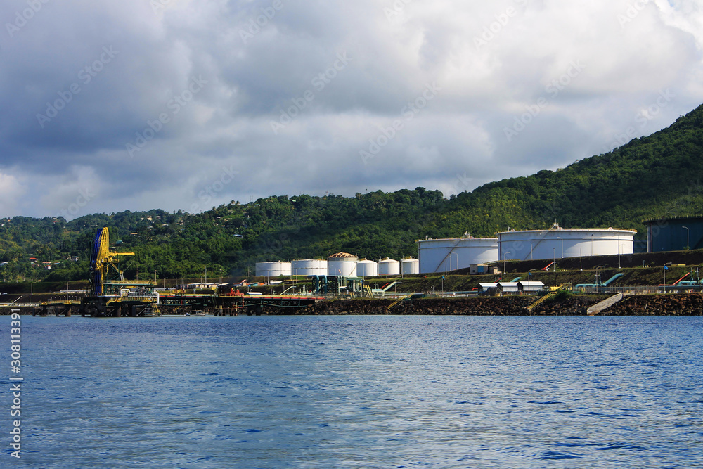 Oil storage tanks along the shore, St. Lucia, West Indies