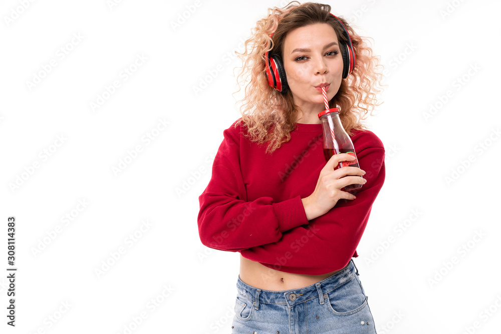 curly blonde girl in headphones with a transparent glass on a white background curly blonde girl in headphones with a transparent glass on a white background