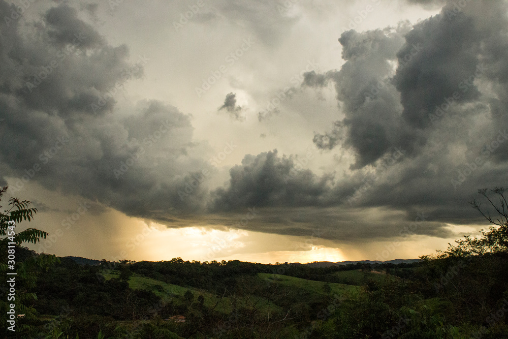 Fototapeta premium Landscape with rising thunderstorm.