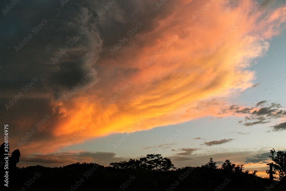 Sunset in the anvil of a thunderstorm.